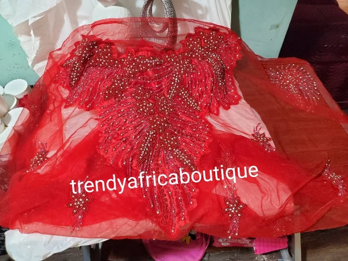 Red Heavily-beaded/crystal stones net George for making blouses. Popularly use by Igbo/Delta/edo women for big Occasions. Comes in 1.8yds lenght already design for your beautiful celebrant blouse