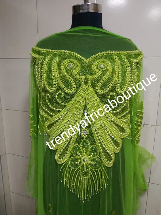 Lemon green Heavily-beaded net for making blouses. Popularly use by Igbo/Delta/edo women for big Occasions. Comes in 1.8yds lenght already design for your beautiful blouse