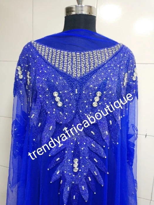 Royal blue Heavily-beaded net for making blouses. Popularly use by Igbo/Delta/edo women for big Occasions. Comes in 1.8yds lenght already design for your beautiful blouse